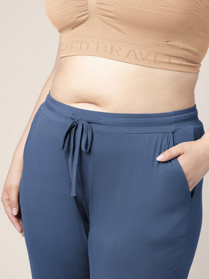 Closeup of a model wearing the Everyday Lounge Jogger in Slate Blue