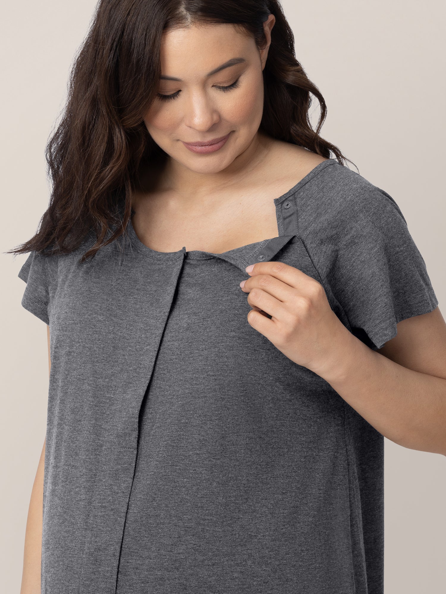 Pregnant model showing the easy clip down nursing and labor access on the Universal Labor & Delivery Gown in Grey Heather