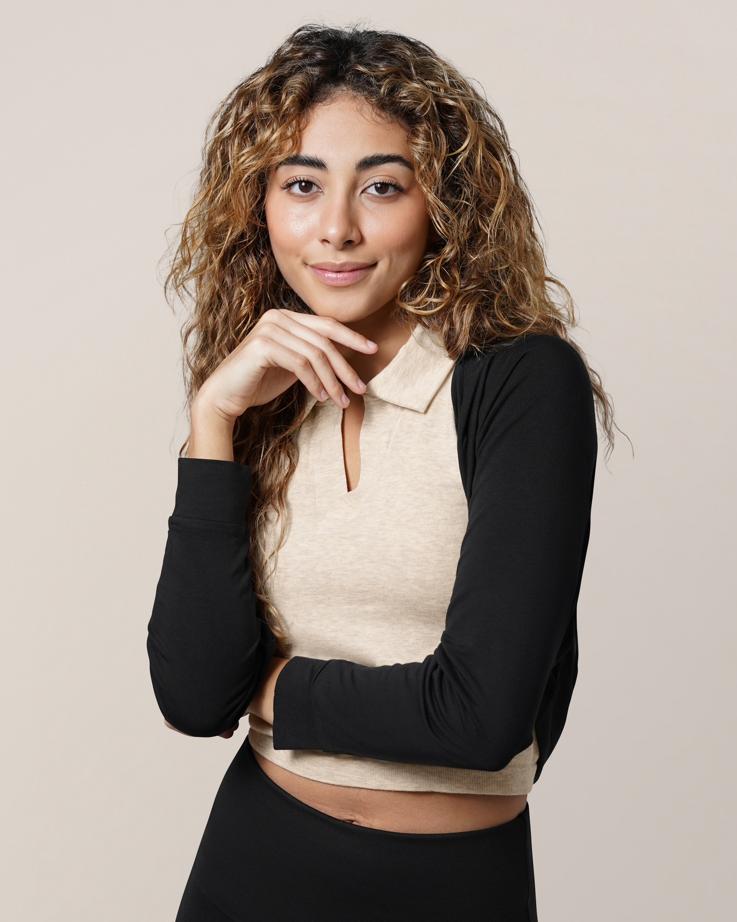Front view of model wearing the French Terry Cardigan Shrug in Black, paired with the Sublime® Bamboo Collared Maternity & Nursing Longline Bra Top in Oatmeal Heather and Louisa Legging. 