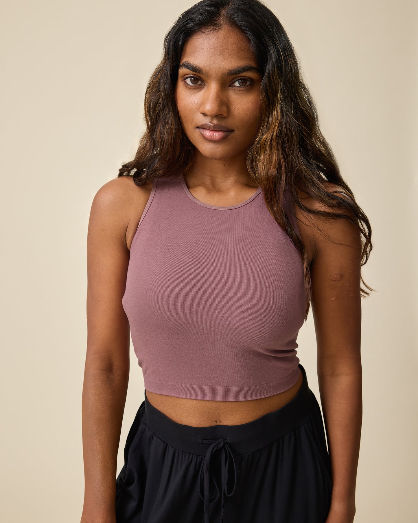 Front view of model wearing the Sublime® Bamboo Maternity & Nursing Longline Bra in Twilight. @model_info:Sahana is wearing a Busty Small.