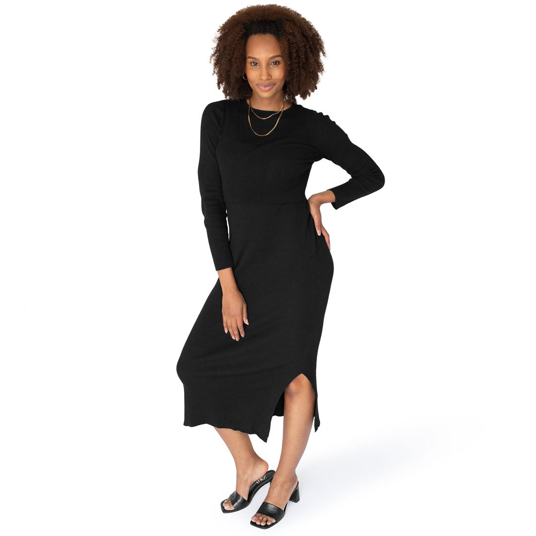 Model wearing the 2-in-1 Maternity & Nursing Midi Dress in Black with her hand on her hip.