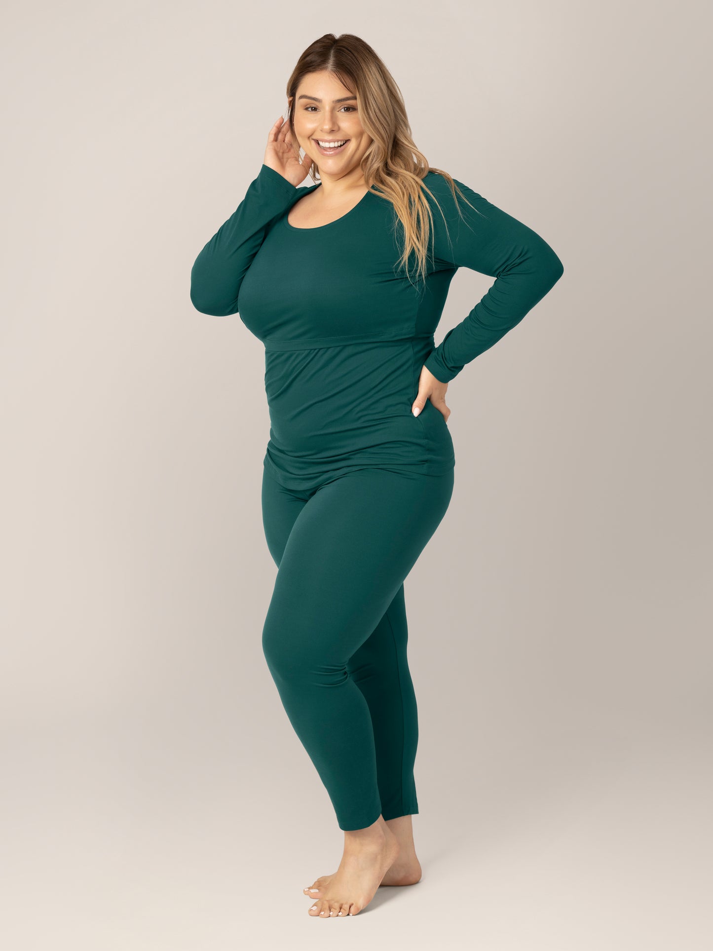 3/4 side view of model wearing the Jane Nursing Pajama Set in Evergreen