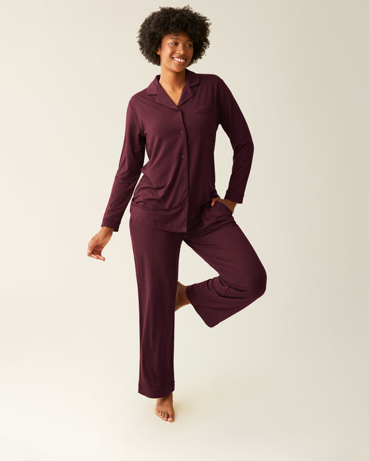 Woman wearing the Clea Bamboo Long Sleeve Pajama Set in Deep Burgundy @model_info:Kyra is 5'9" and wearing a Small.