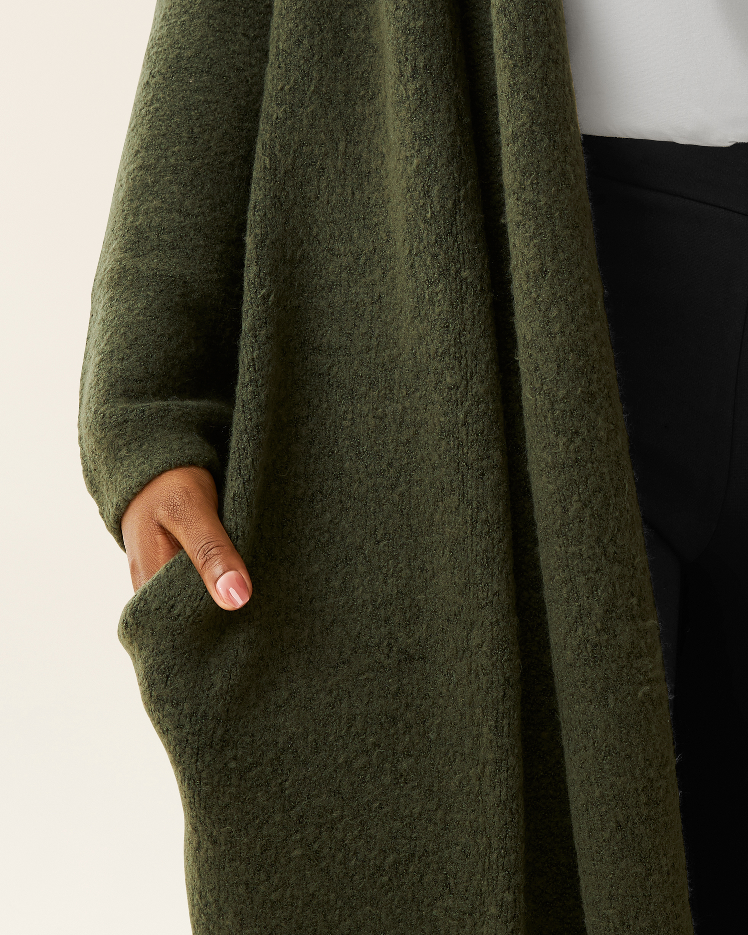 Pocket and fabric detail image on the Chloe Cardigan Sweater in Ecru 