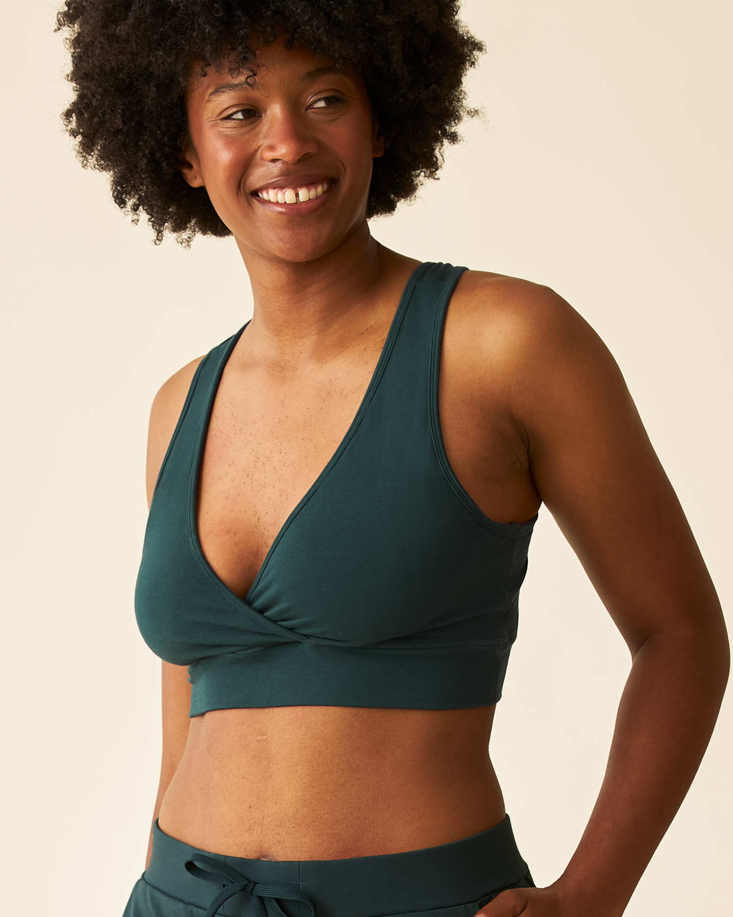 Front view of model wearing French Terry Racerback Nursing & Sleep Bra in Deep Evergreen@model_info:Kyra is wearing a Small.