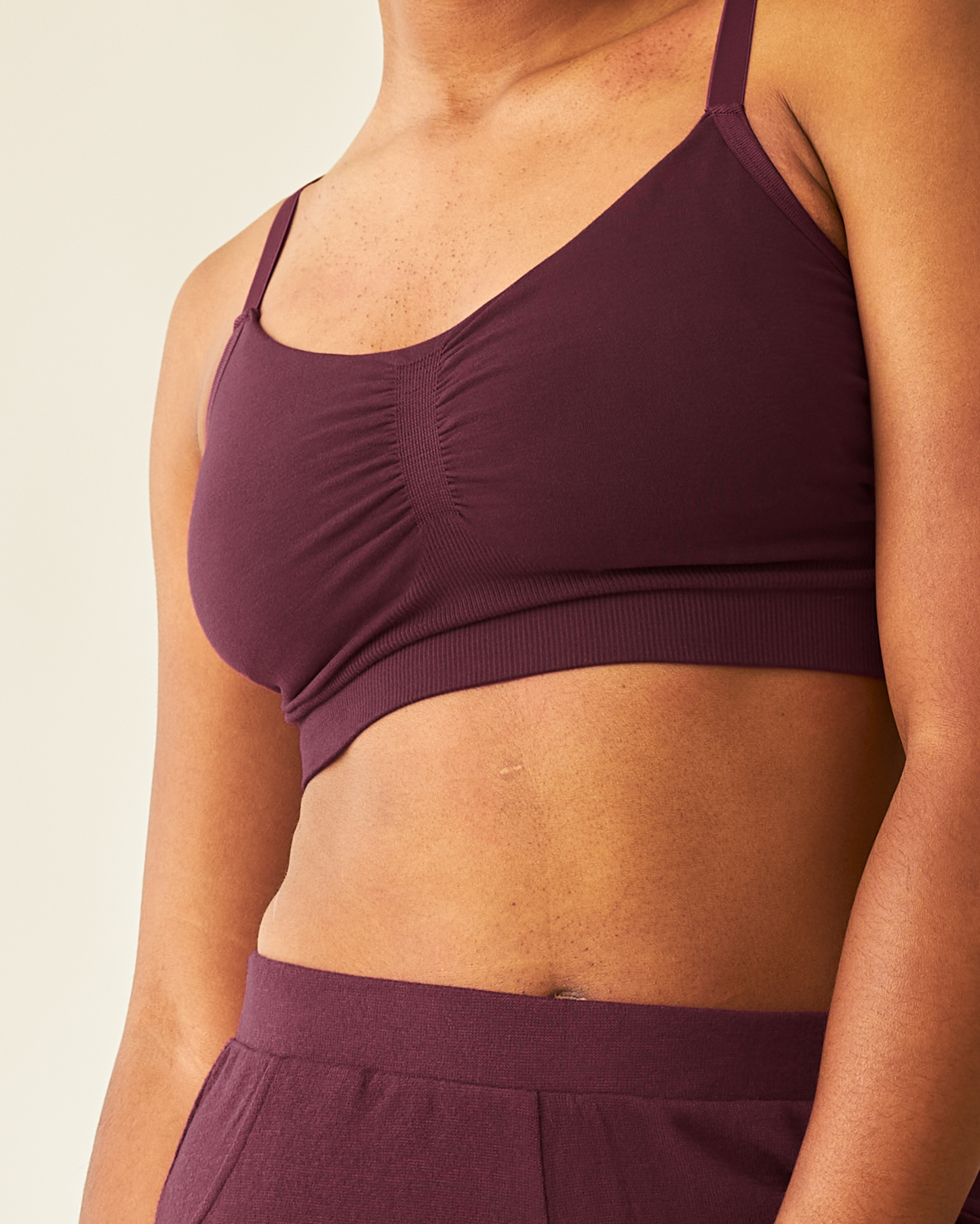 Close-up of woman wearing the Sublime® Bamboo Hands-Free Pumping Lounge & Sleep Bra in Deep Burgundy