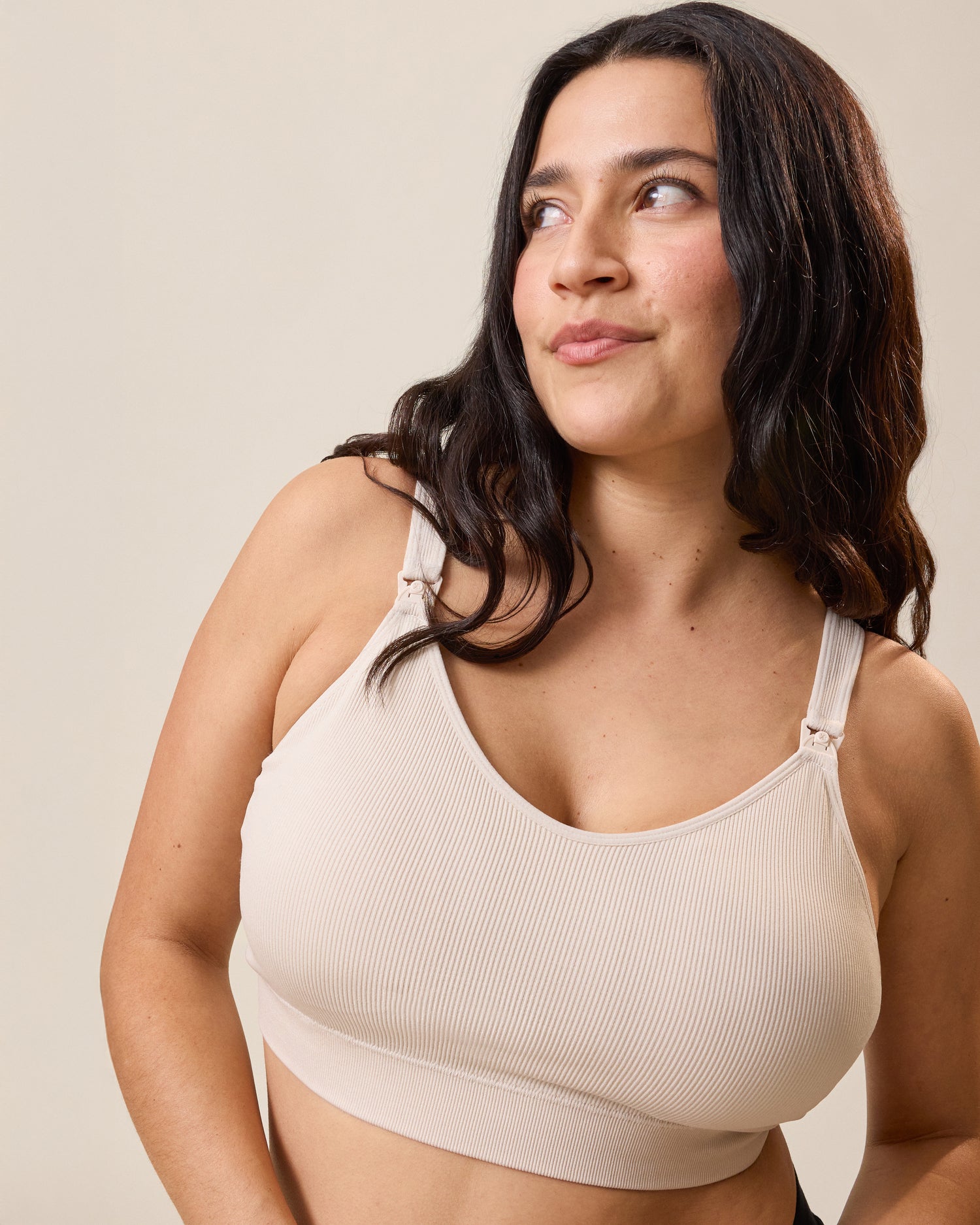Woman wearing the Mia Maternity & Nursing Lounge Bra in Stone.