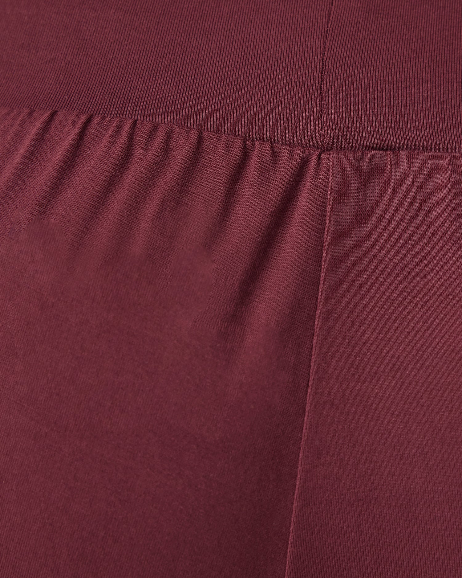 Close up of material and color on Aria Bamboo Casual Lounge Short in Deep Burgundy.