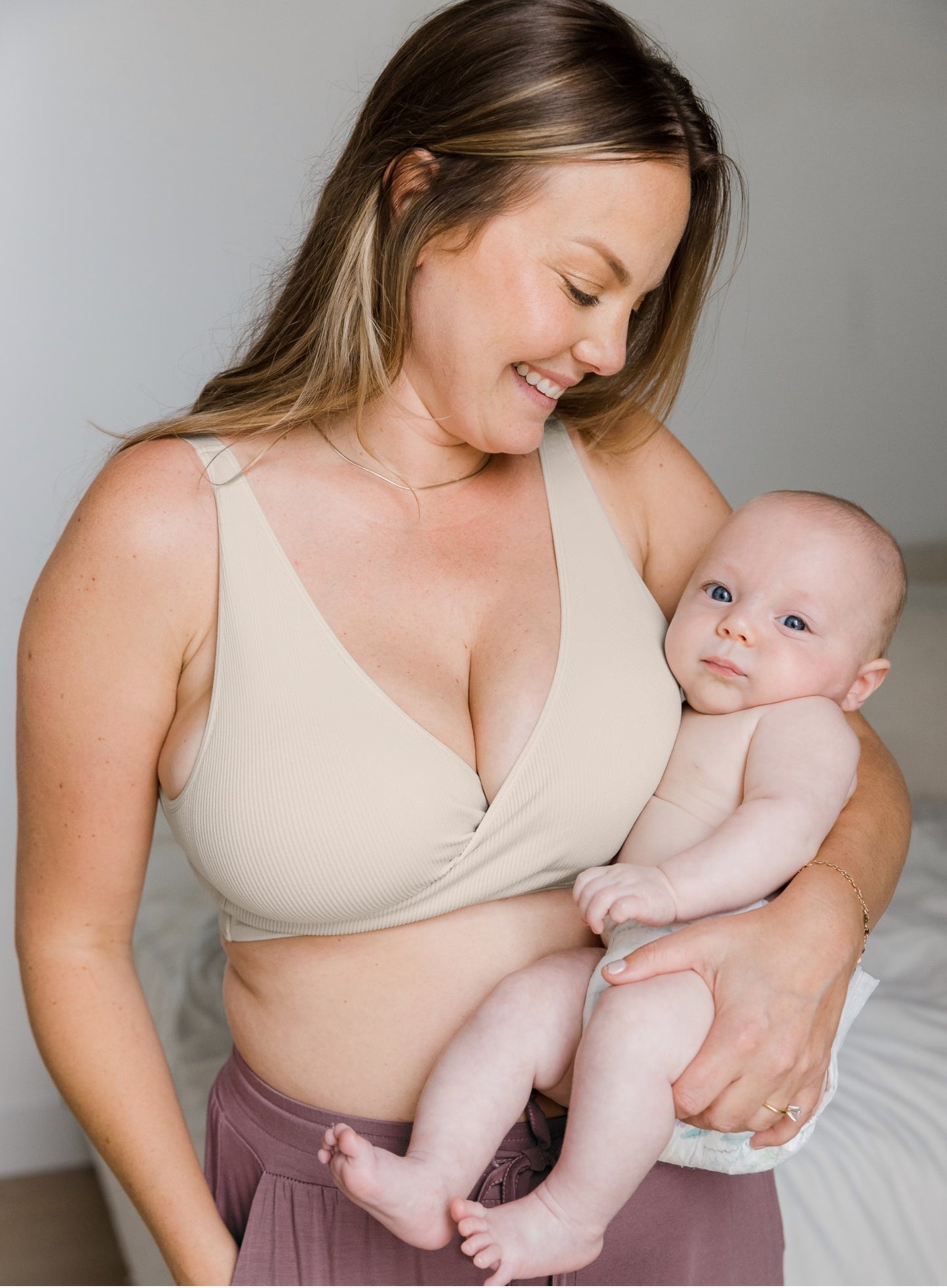 Model wearing the Sublime® Adjustable Crossover Nursing & Lounge Bra in Stone