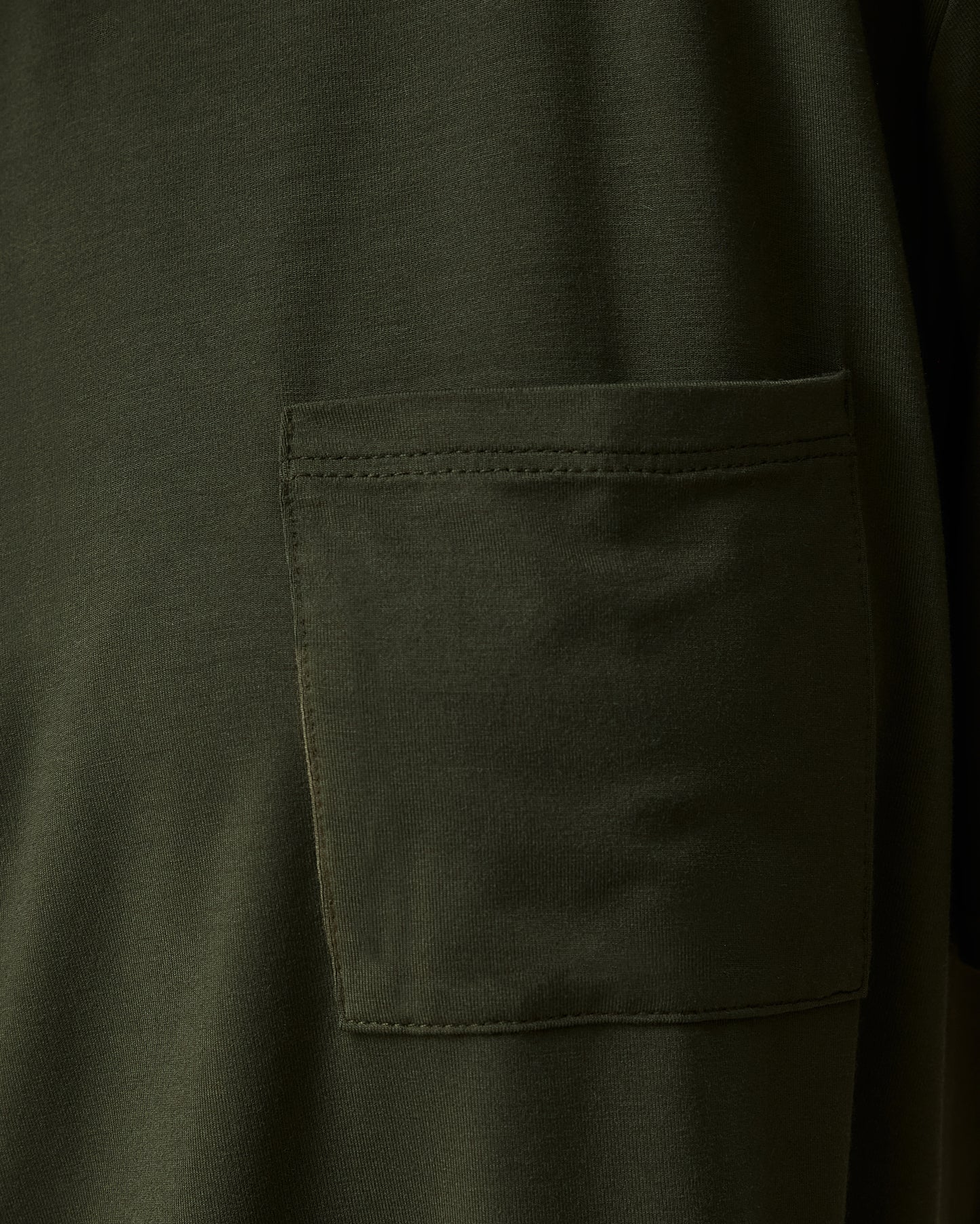 Close up of pocket on Aria Bamboo Casual Cropped Short Sleeve Top in Thyme