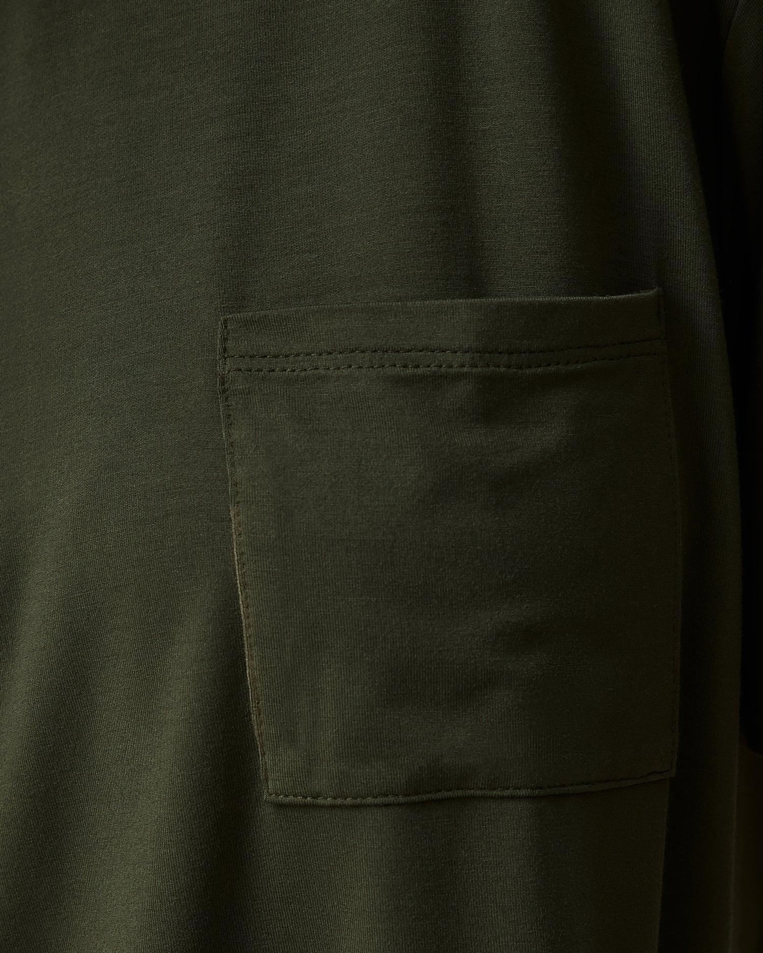 Close up of pocket on Aria Bamboo Casual Cropped Short Sleeve Top in Thyme