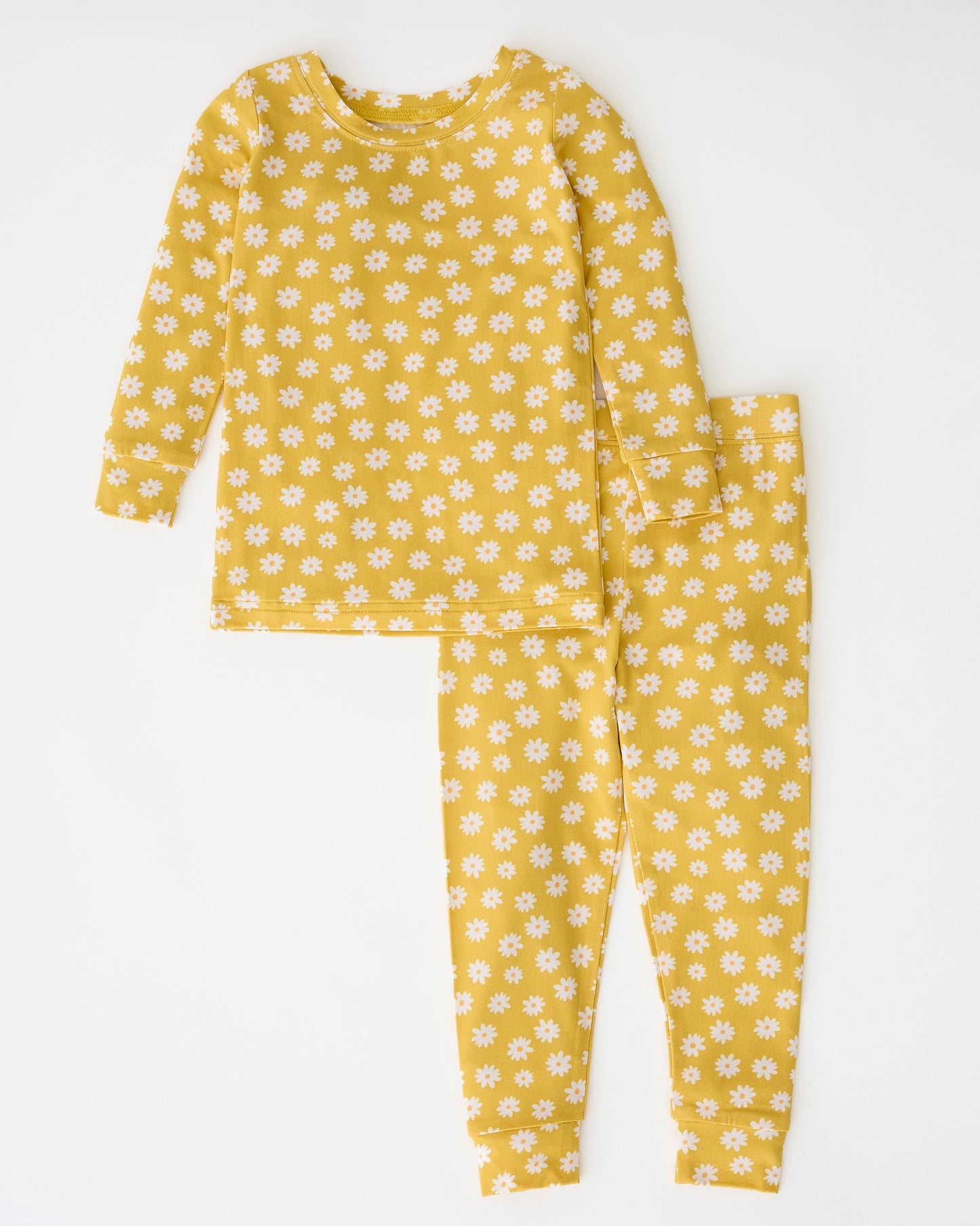 Bamboo Baby Two-Piece Pajama Set in Yellow Daisies on a beige background