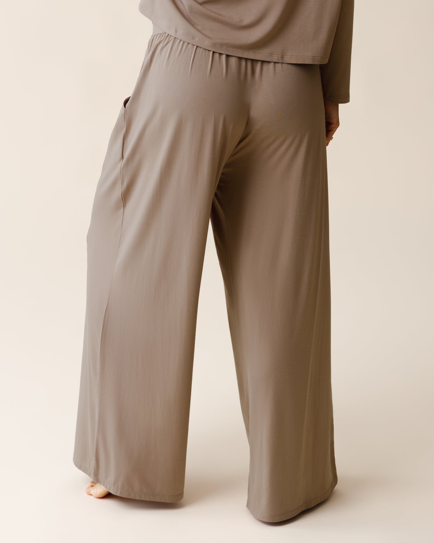 Woman wearing the Aria Bamboo Casual Lounge Pant in Taupe with matching top, showing pants from the pack