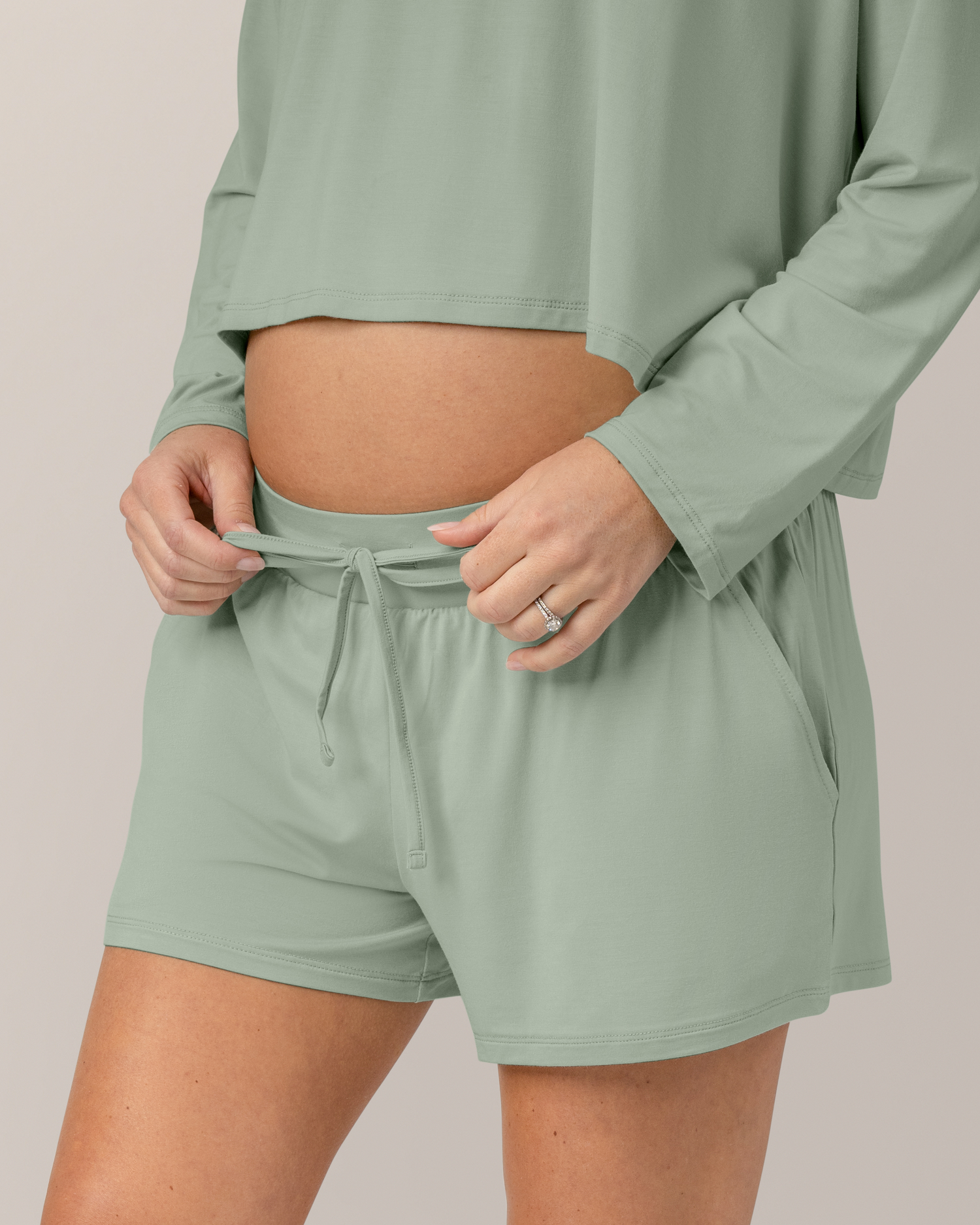 Close up of model wearing the Aria Bamboo Casual Lounge Short in  Aqua Mist, showing drawstring detail.