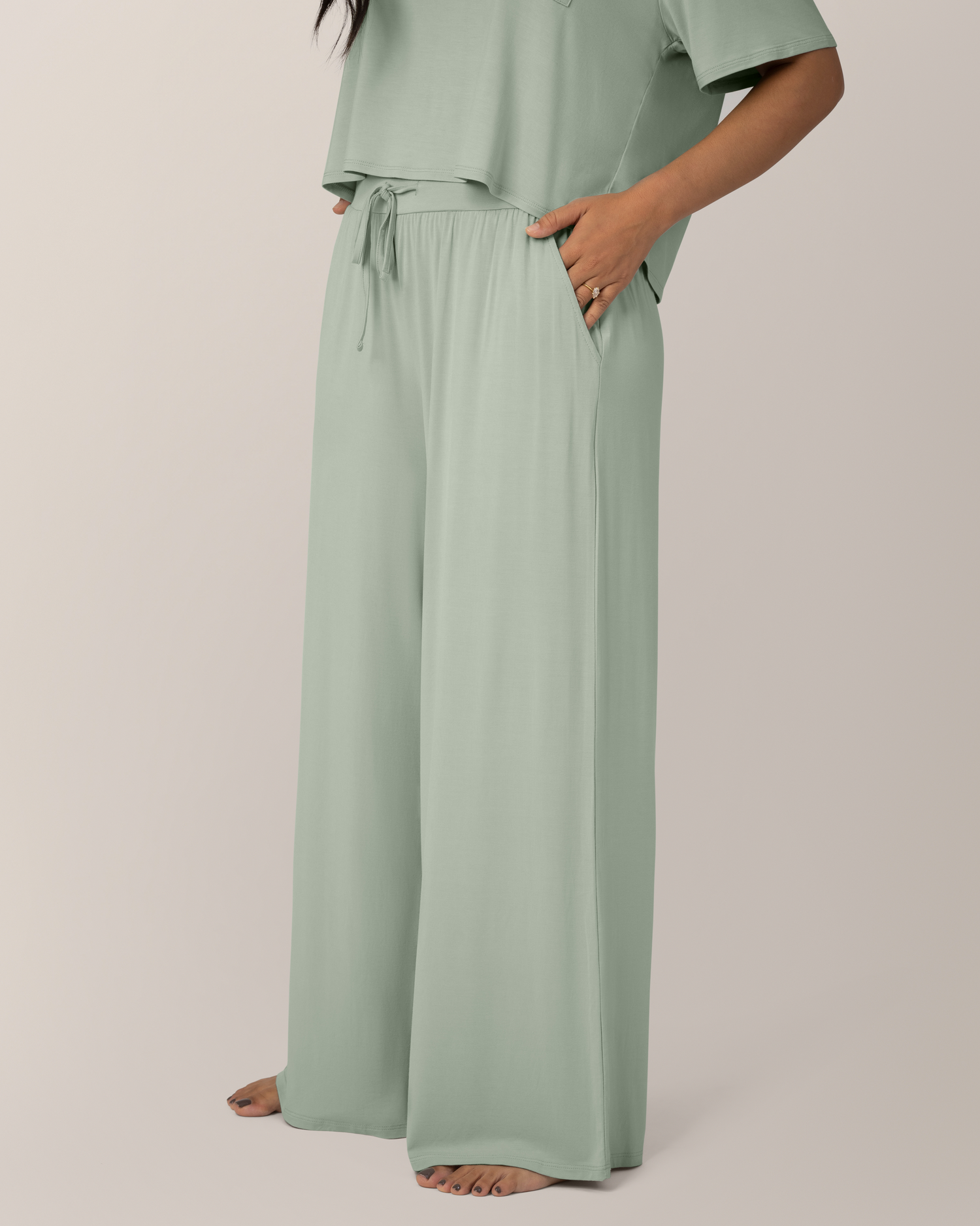 Close up of model wearing the Aria Bamboo Casual Lounge Pant in Aqua Mist 