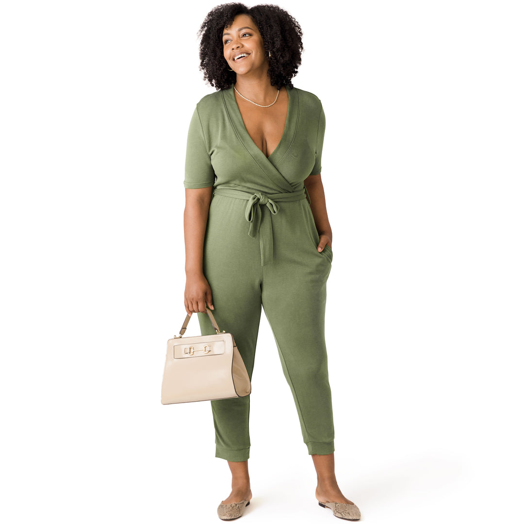 Front view of a model wearing the Around the Clock Nursing Jumpsuit in Olive.