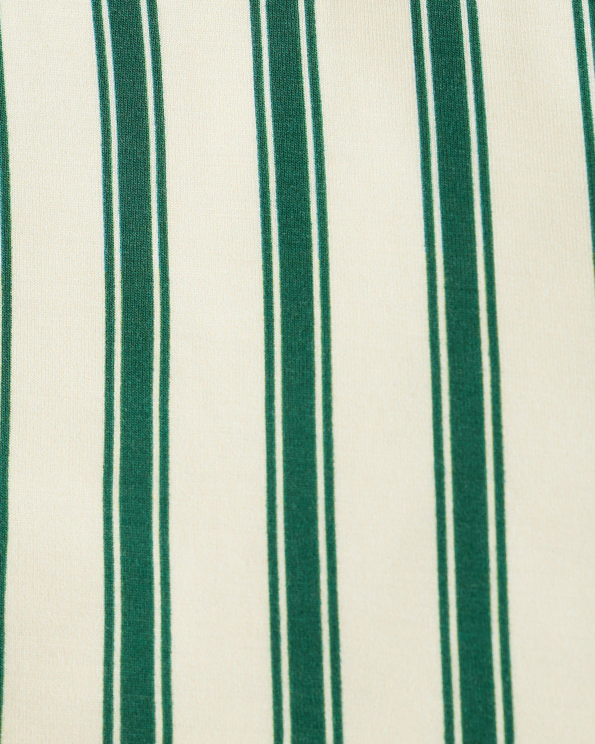 Close up of pattern detail on Bamboo Baby Two-Piece Pajama Set in Green Candy Stripe.