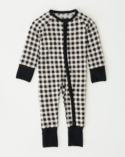 Bamboo Baby Pajama in Black Gingham on an off white background.
