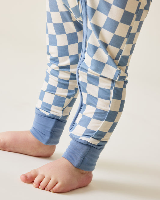 Close up of Baby wearing the Bamboo Baby Pajama in Blue Checker print