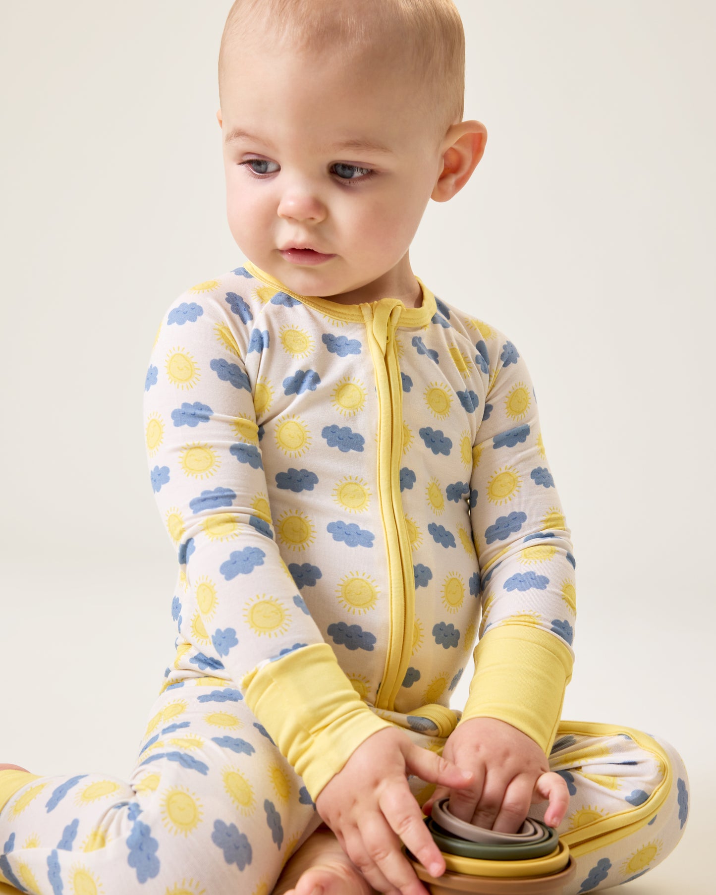 Baby wearing the Bamboo Baby Pajama in Sunny Day print@model_info:Clark is wearing 18-24 months.