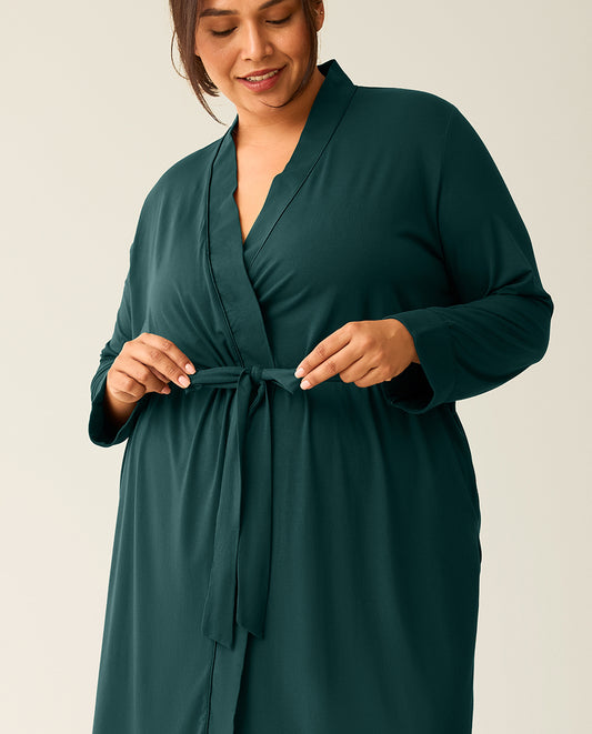 Woman wearing a dark green robe