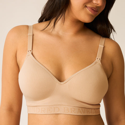 Beige Signature Sublime Contour Pumping & Nursing Bra worn by a model on a plain background