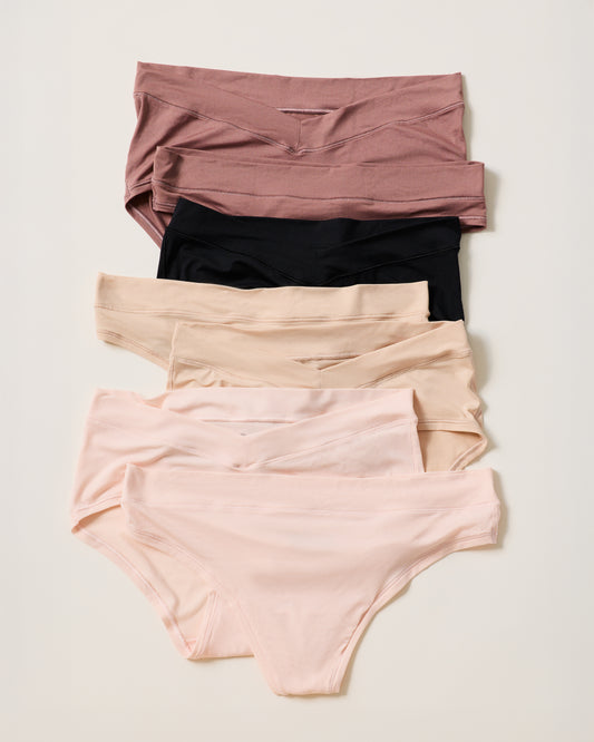 7-for-$39 Build Your Own Underwear Bundle. Choose from Grow with Me™ Brief,  Grow with Me™ Hipster, Grow with Me™ Thong, Grow with Me™ Boyshort, Bamboo Hipster, and Bamboo Thong, on a beige background.