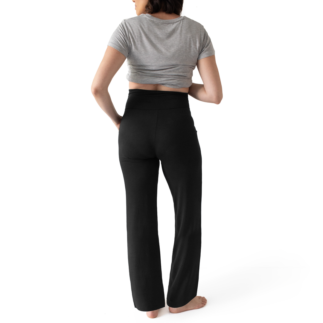 Back view of a pregnant model wearing the Bamboo Maternity & Postpartum Lounge Pant in Black