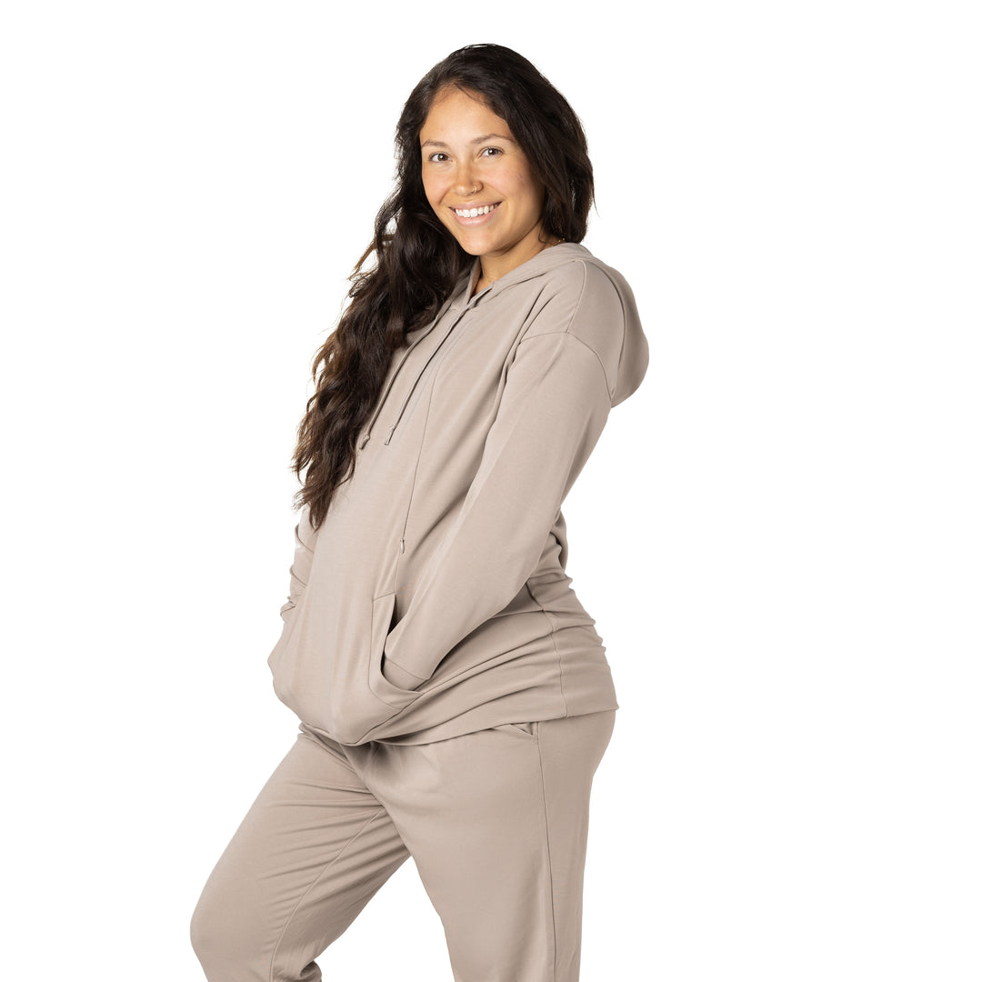 Side view of a model wearing the Bamboo Nursing Hoodie in Stone Taupe