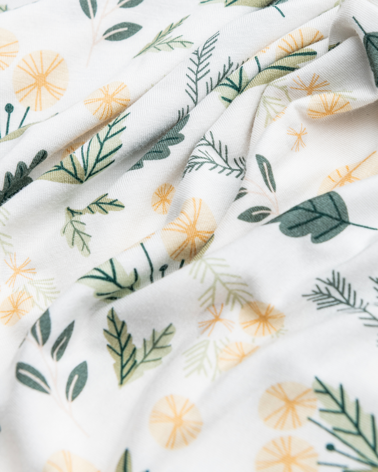 Close-up of Bamboo Knotted Baby Gown in Honey Dandelion