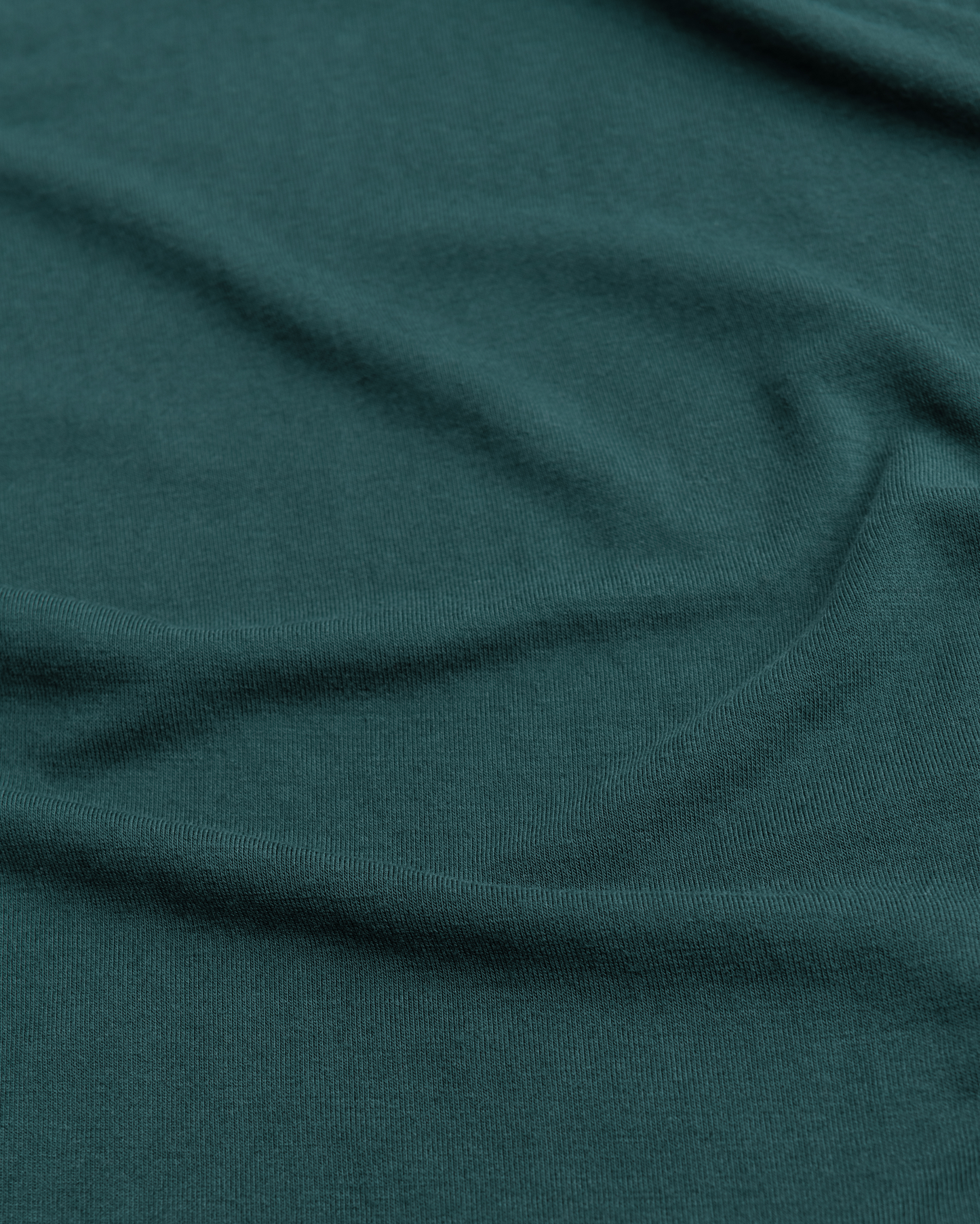 Close-up of fabric on Bamboo Baby Pajamas in Evergreen with visible texture