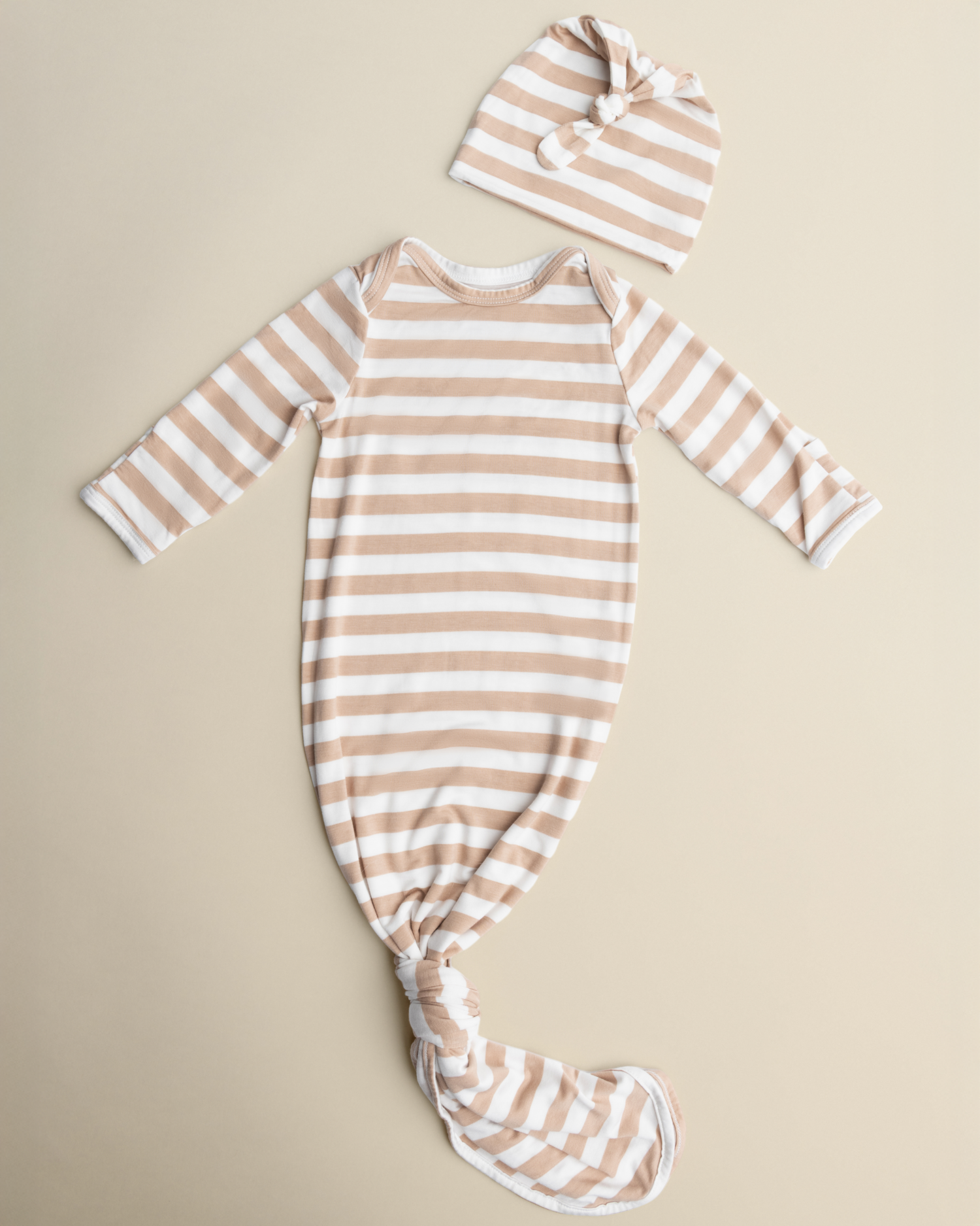 Bamboo Knotted Baby Gown in Fawn Stripe on a beige background