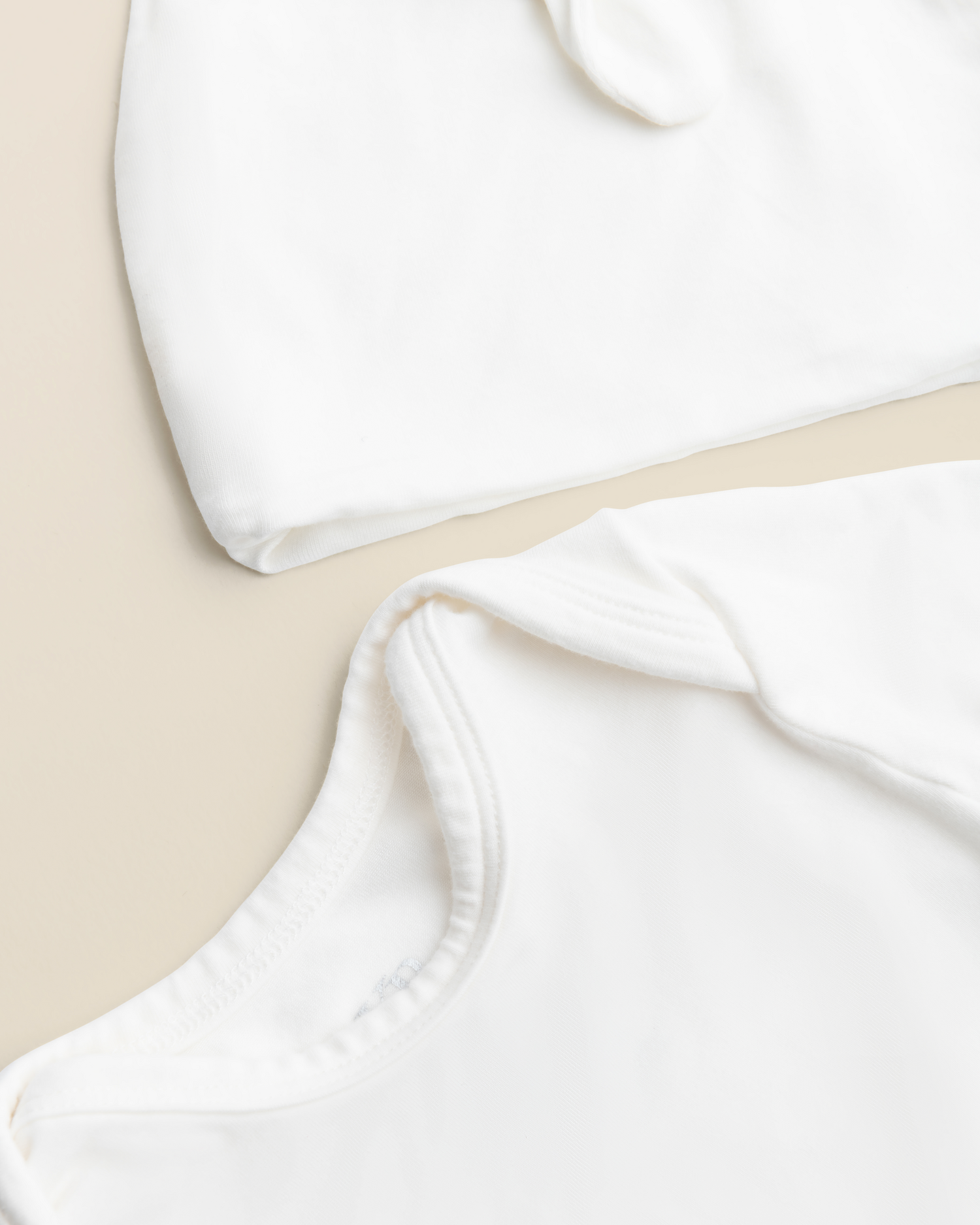 Close up of Bamboo Knotted Baby Gown in Pearl