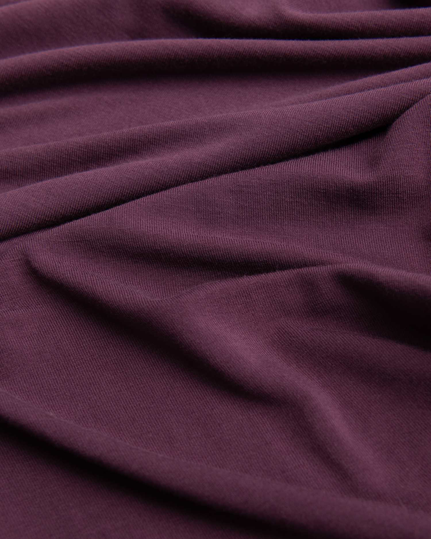 Close-up of Bamboo Knotted Baby Gown in Burgundy Plum