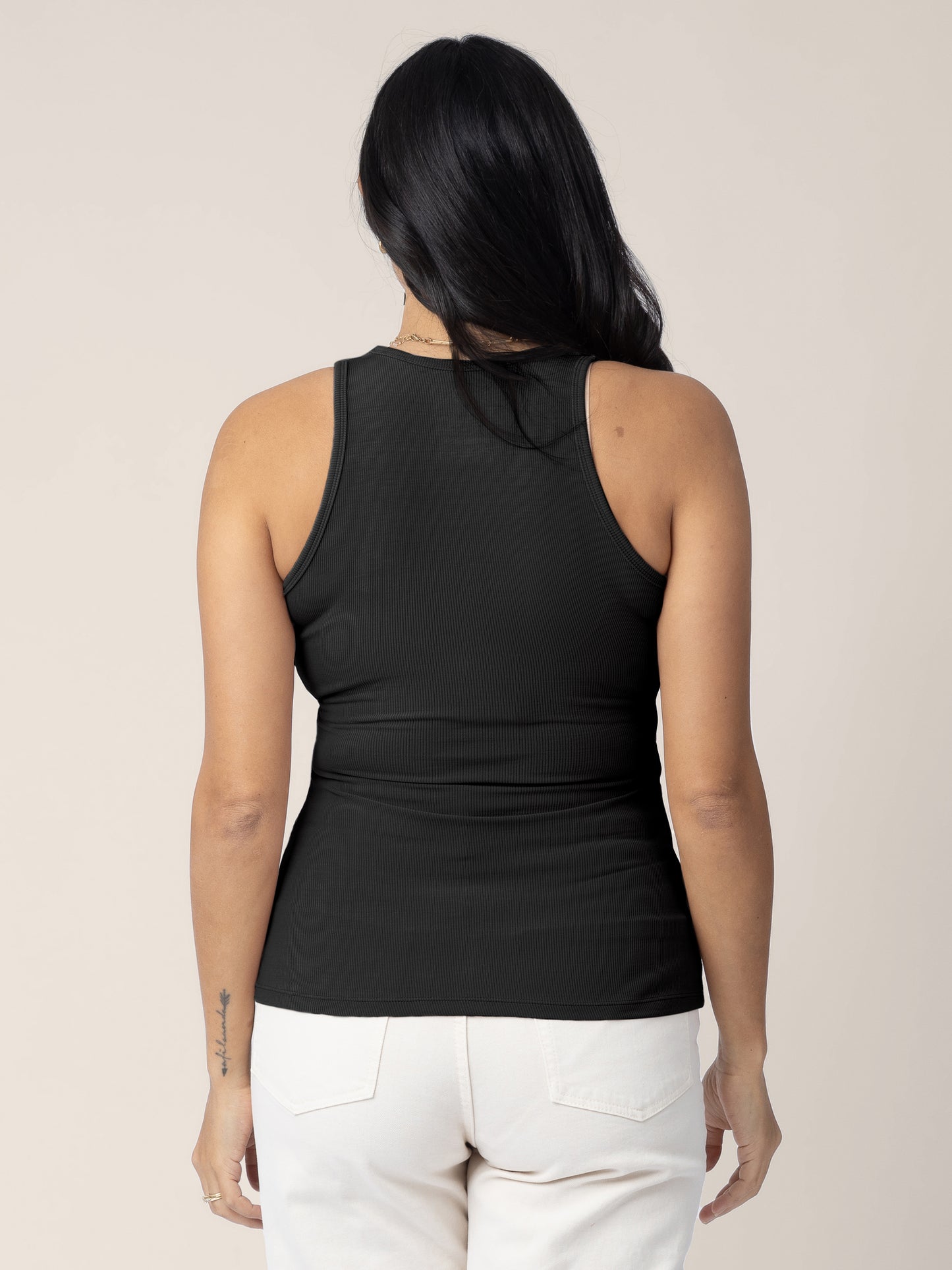 Back view of model wearing the Ribbed Bamboo Racerback Nursing Tank in black 