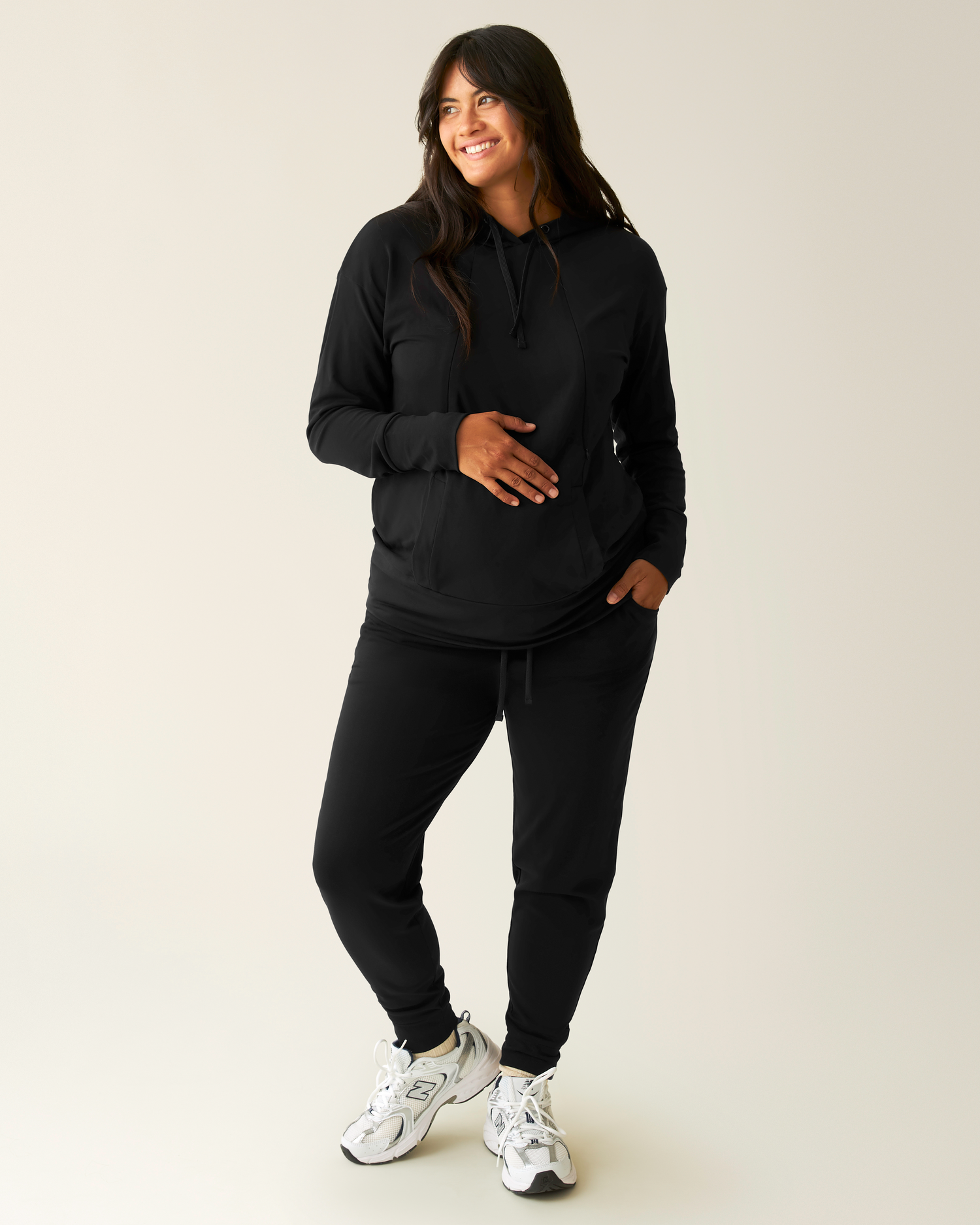 Front view of model wearing Brushed Bamboo Maternity & Postpartum Jogger in Black @model_info:Zoe is 5'7" and wearing a Medium.