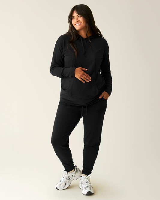 Front view of model wearing Brushed Bamboo Maternity & Postpartum Jogger in Black @model_info:Zoe is 5'7" and wearing a Medium.