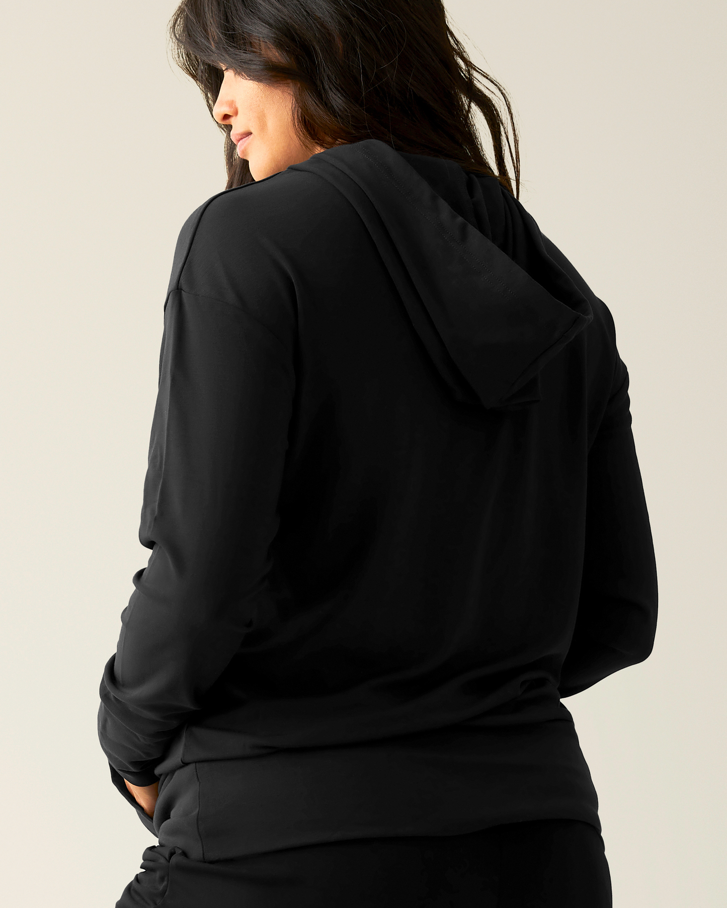 Back view of model wearing Brushed Bamboo Maternity & Nursing Hoodie in Black