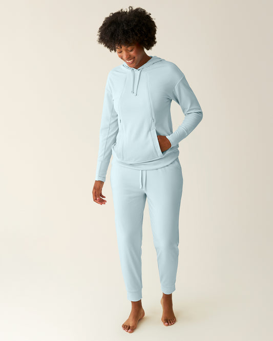 Front view of model wearing Brushed Bamboo Maternity & Postpartum Jogger in Powder Blue@model_info:Kyra is 5'9" and wearing a Small.
