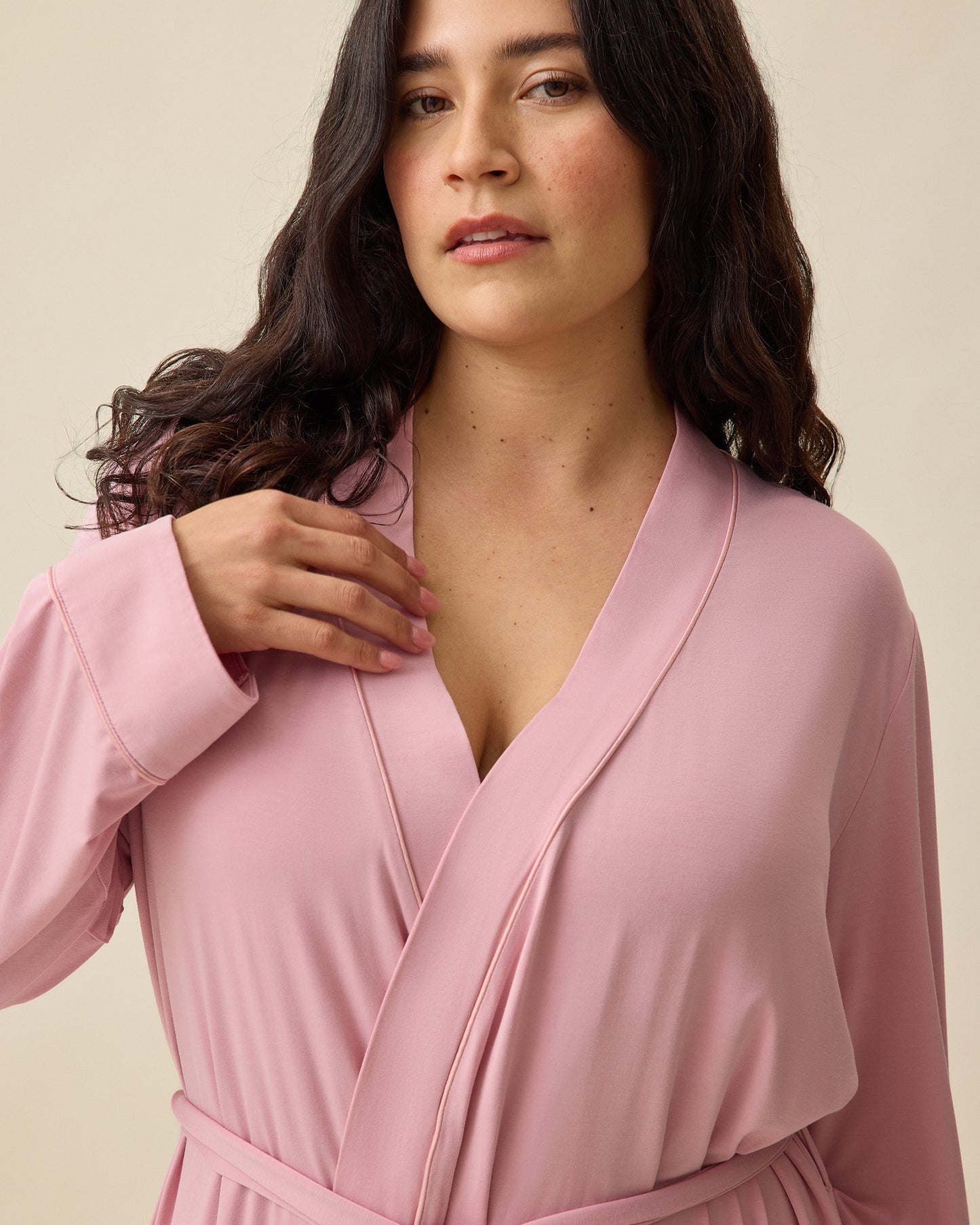 Close up of Clea Bamboo Robe in Light Mauve on a beige background