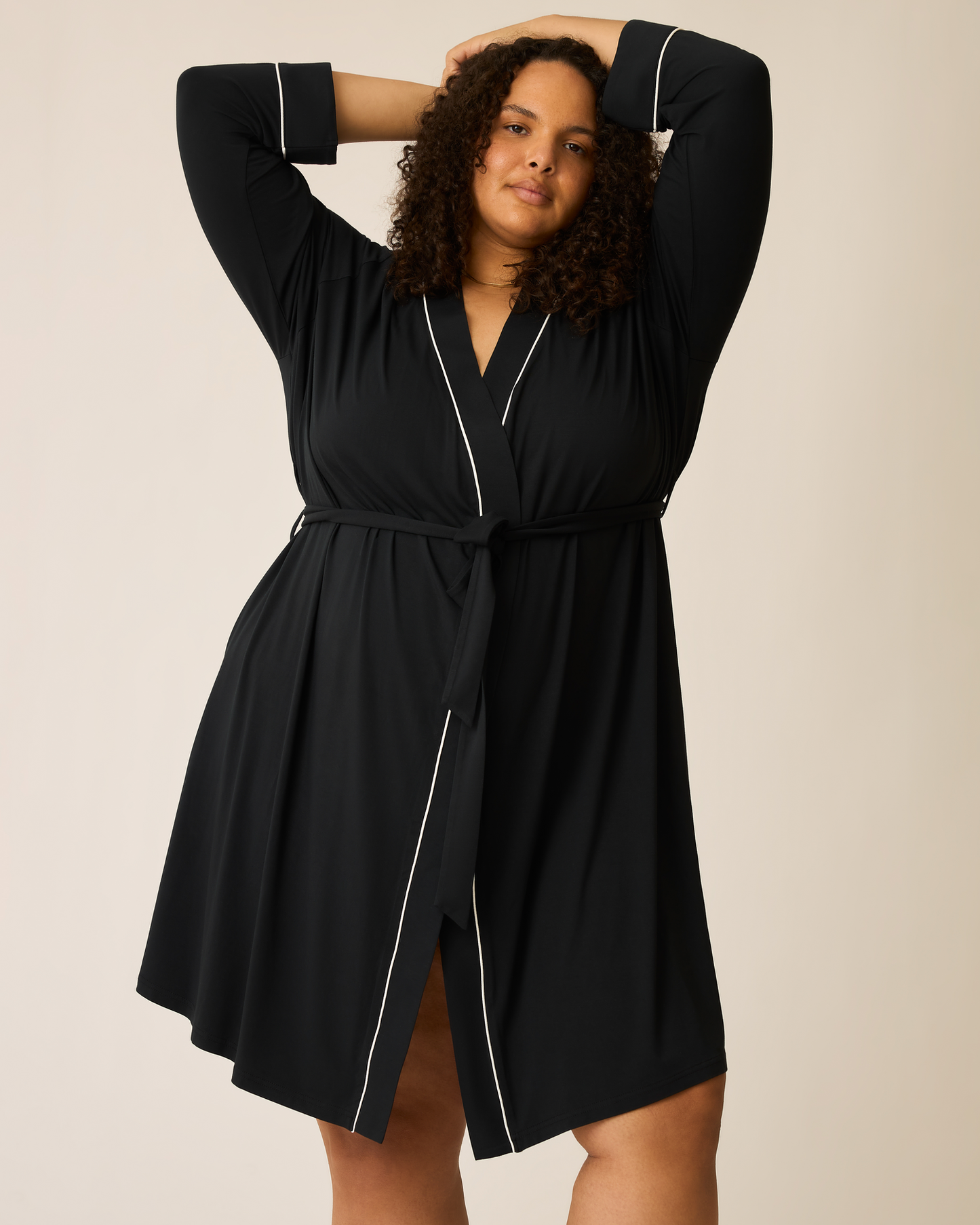 Woman wearing the Clea Bamboo Robe in black with white piping@model_info:Ionna is 5'11" and wearing a 3X/4X.
