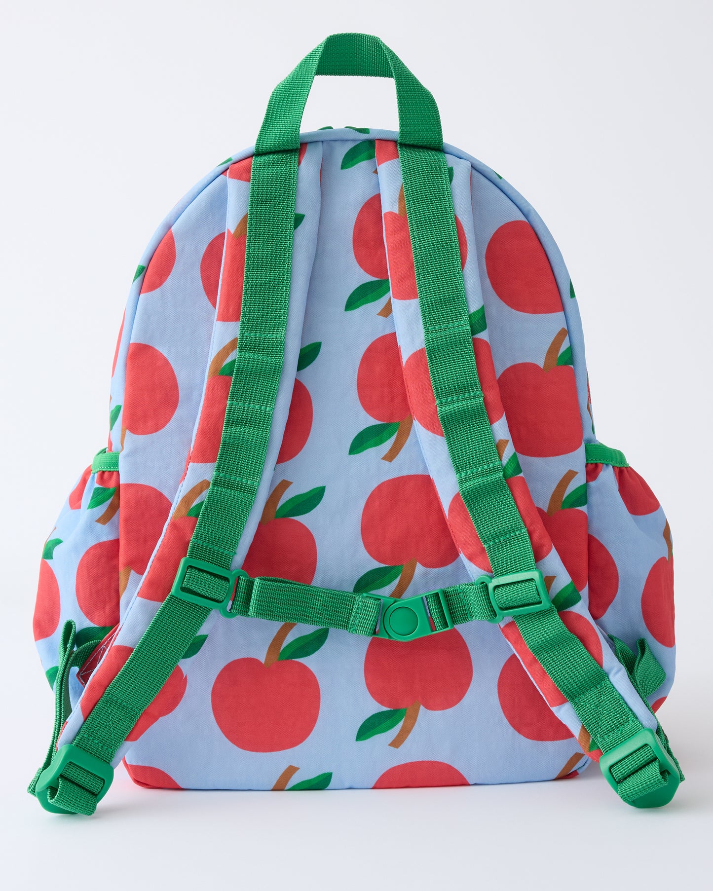 Back view of the Cool Kid Backpack in Blue Apple on a beige background.
