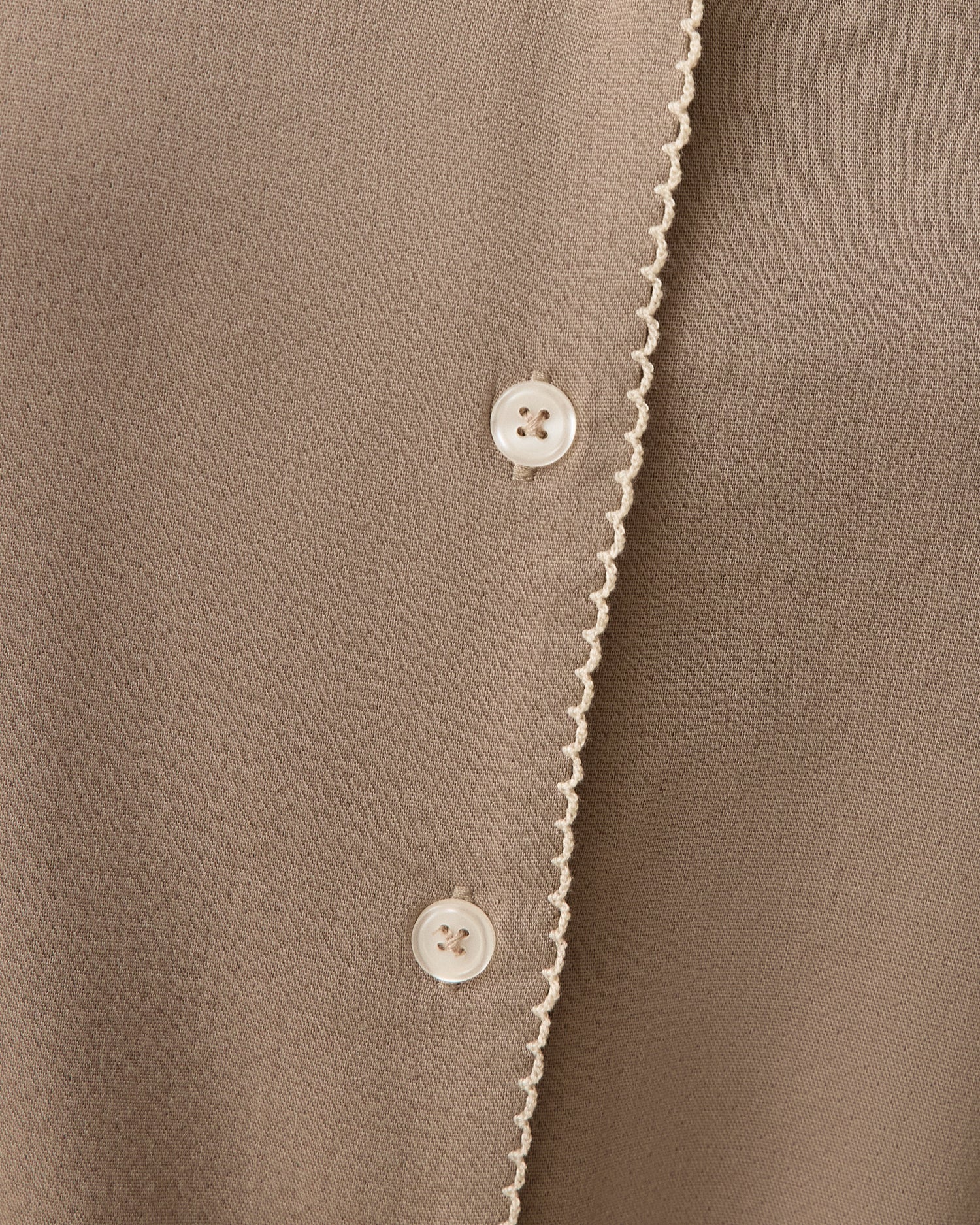 Close up of model wearing Cotton Bamboo Pajama Set in Taupe