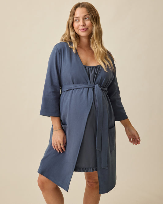 Model wearing Cotton Bamboo Robe in Midnight Blue on a beige background @model_info:Saige is 5'7" and wearing a Medium.