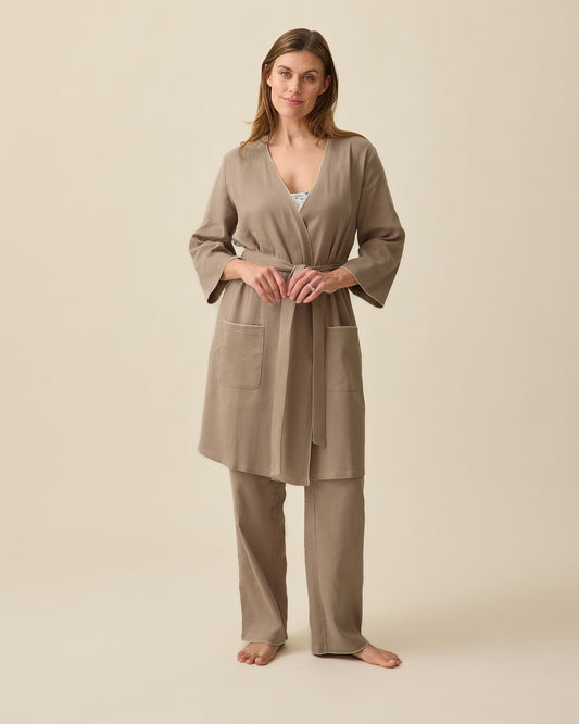 Model wearing Cotton Bamboo Robe in Taupe on a beige background @model_info:Brittany is 5'7" and wearing a Small.