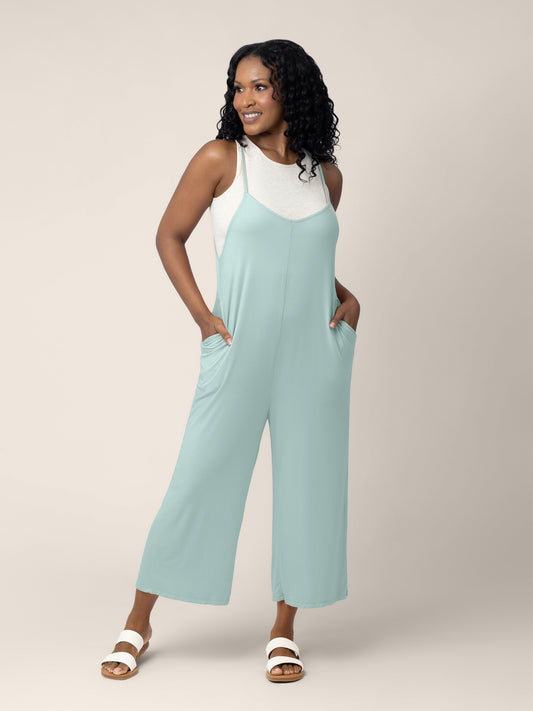 A model wearing the Charlie Maternity & Nursing Romper in Dusty Blue Green @model_info:Rashé is 4 months postpartum; she is 5'6" and wearing a Small.