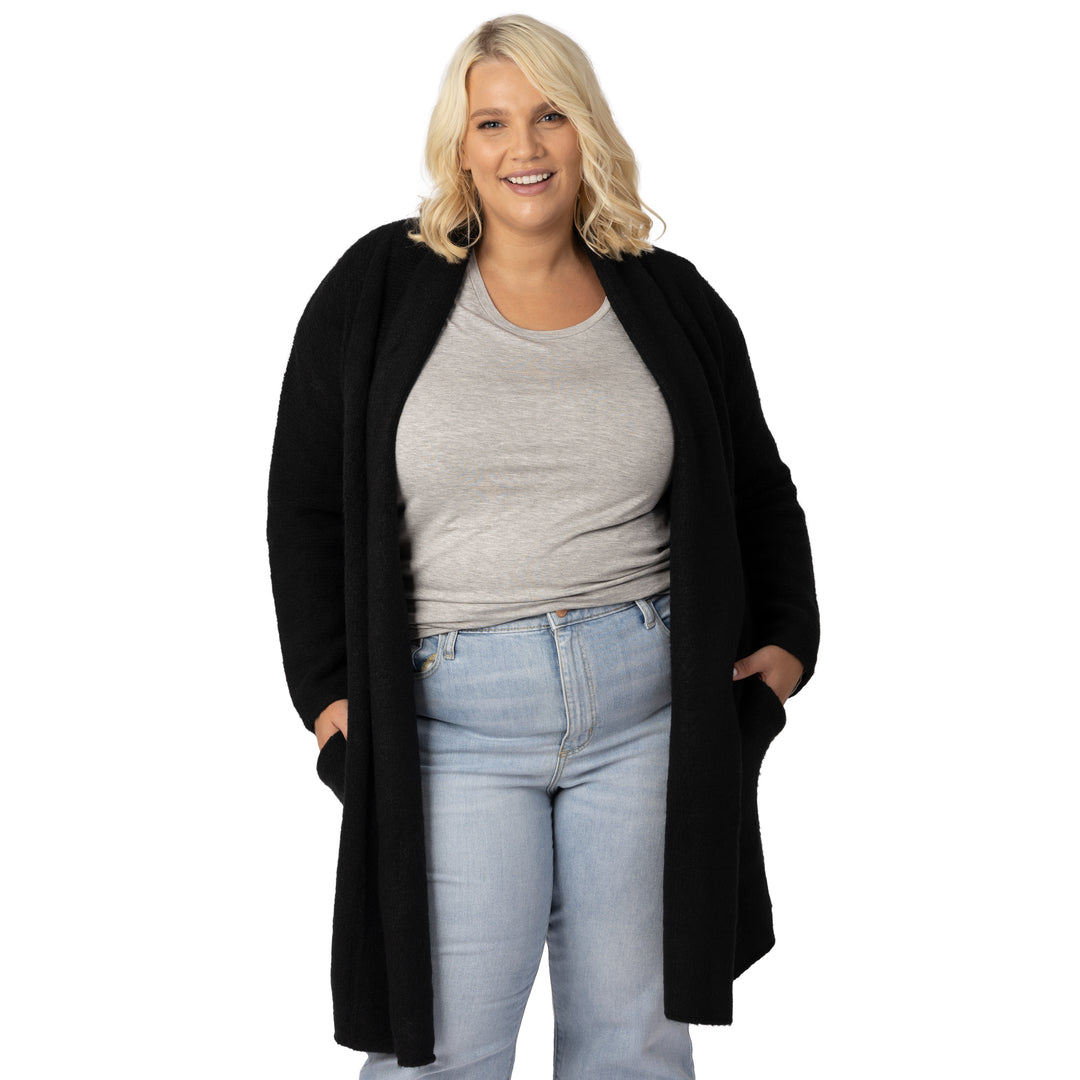 Model wearing the Chloe Cardigan Sweater in Black @model_info:Lauren is wearing an XL/1X.