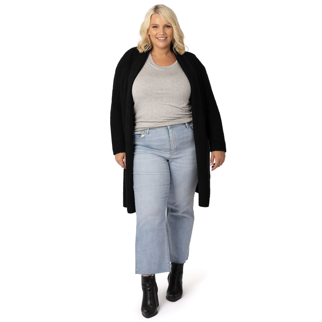 Full body view of a model wearing the Chloe Cardigan Sweater in Black