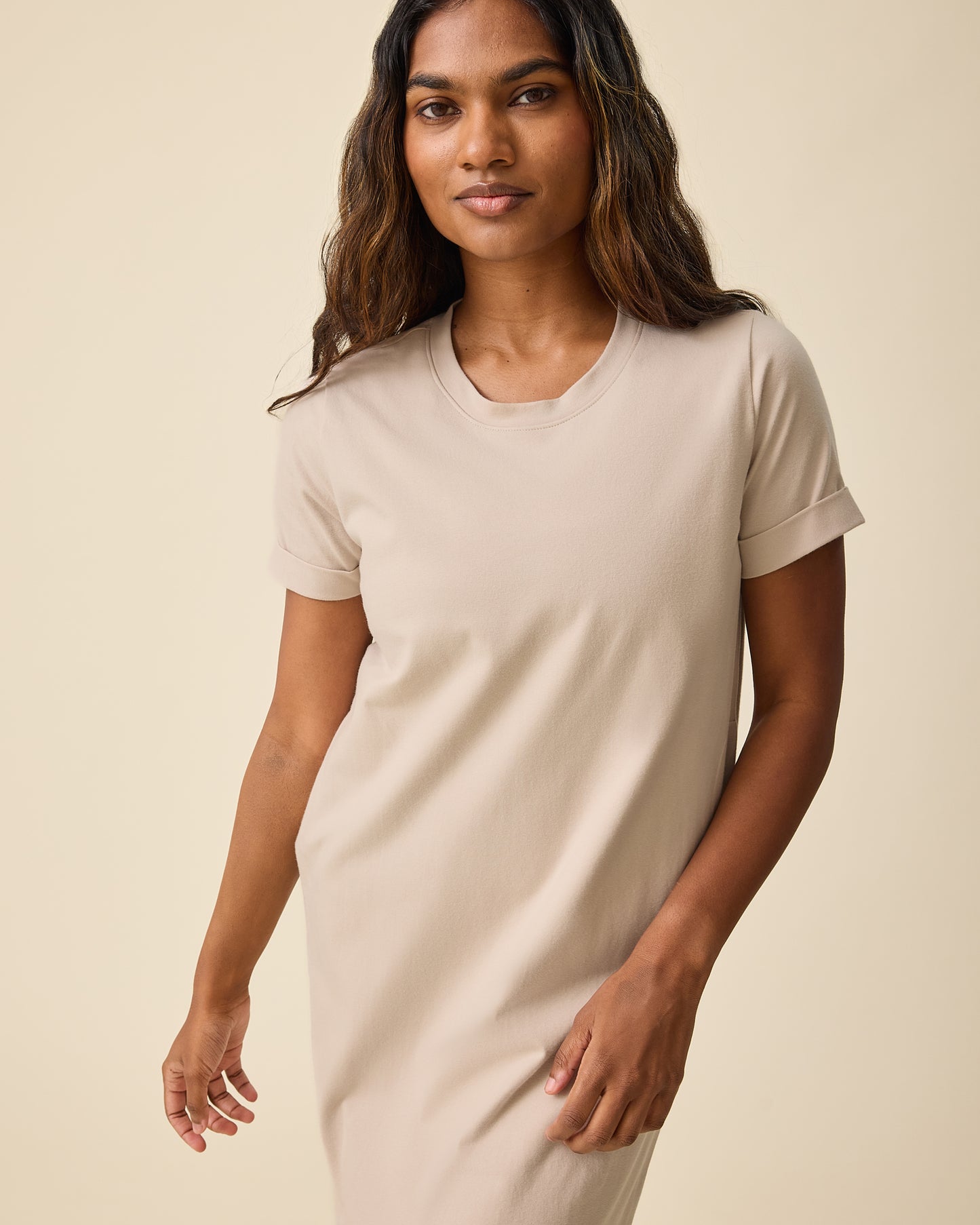 Model wearing the Woman wearing the Classic Nursing T-shirt Mini Dress in Sand