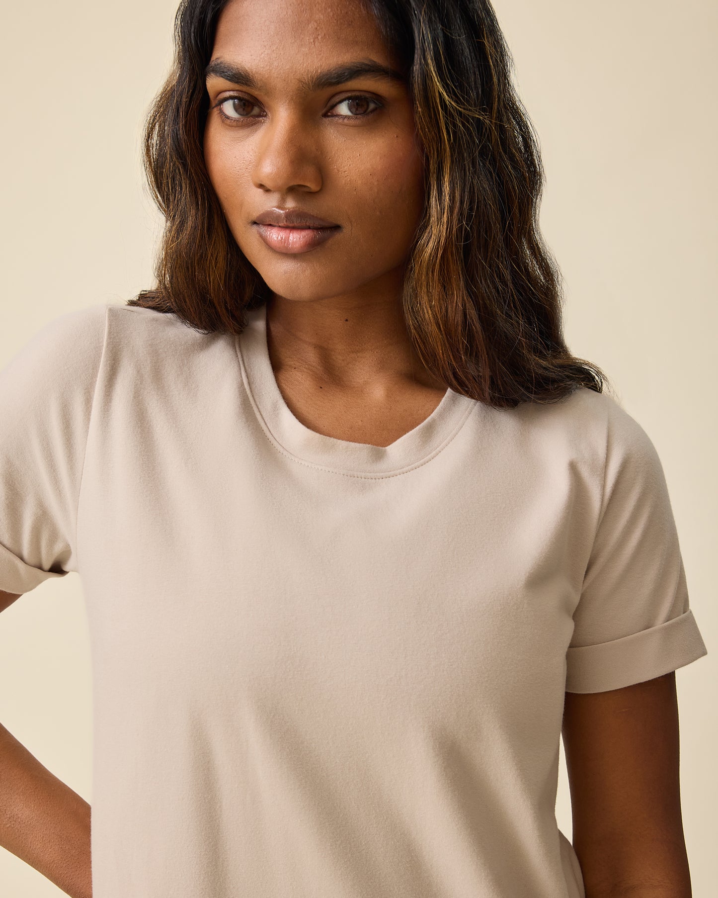 Closeup of woman wearing the Woman wearing the Classic Nursing T-shirt Mini Dress in Sand